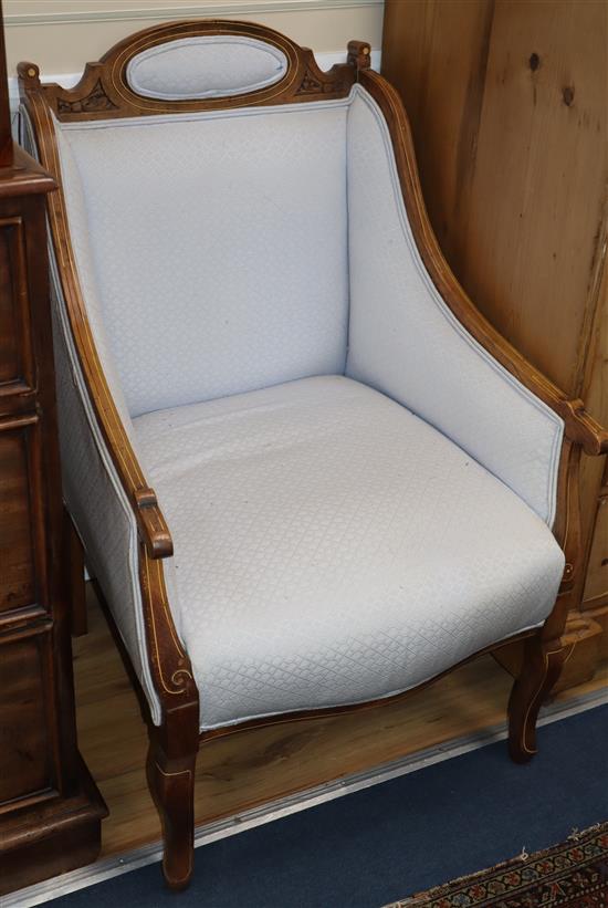 A pair of Edwardian inlaid mahogany tub chairs